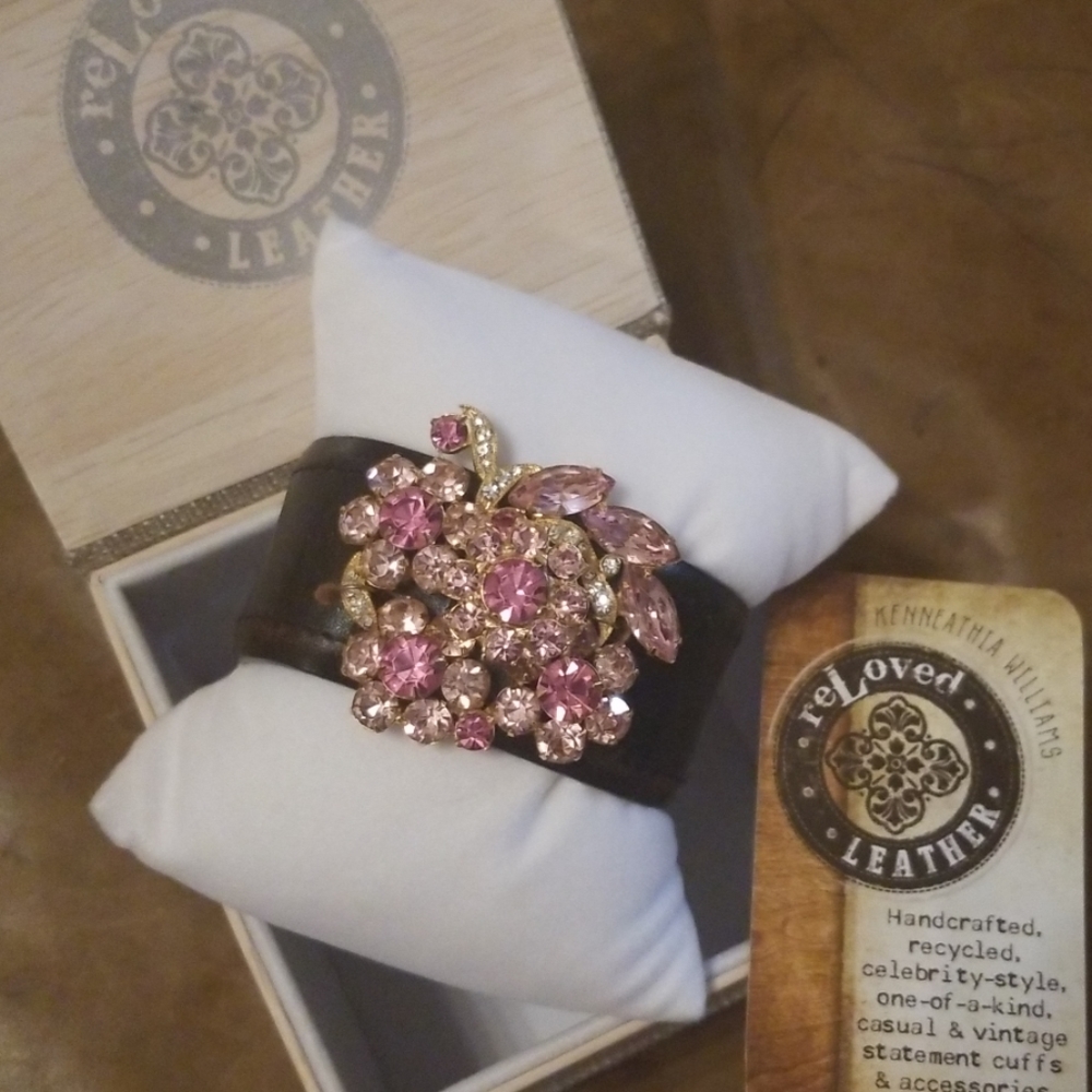 Leather cuff with vintage Schiaparelli brooch